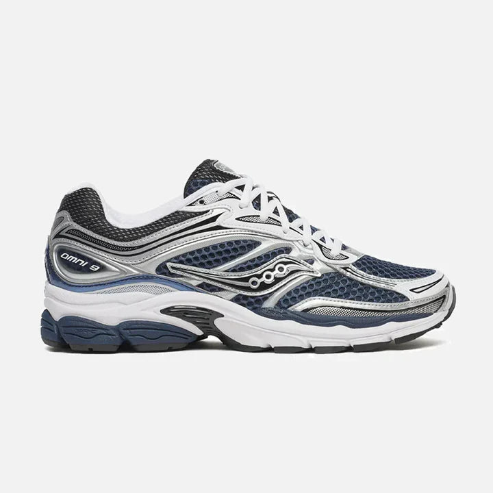 Navy and white running shoe on a white background